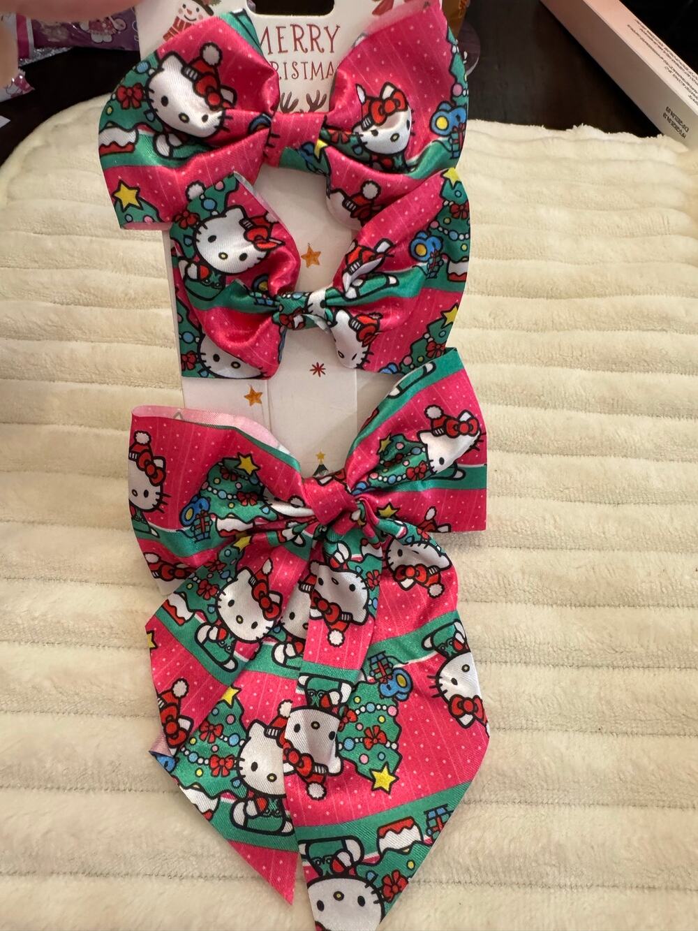 Hello Kitty Christmas bow set of 3 Hello Kitty on a pink and green background